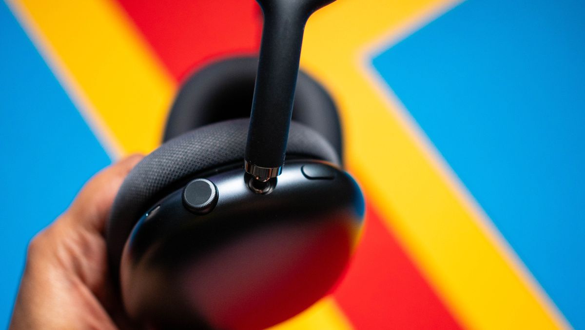 Apple AirPods Max 2 headset against a textured sheet showcasing the design
