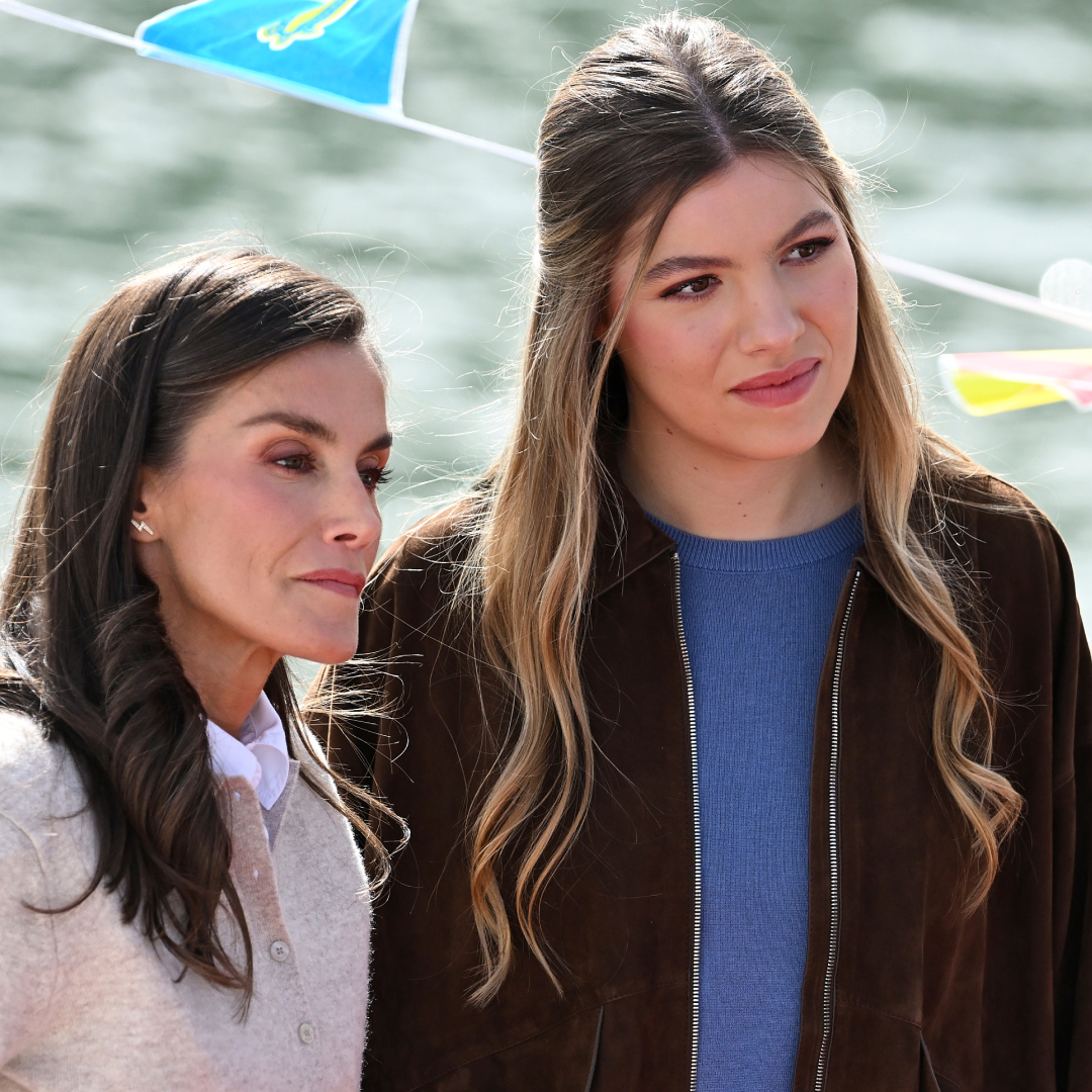 Queen Letizia and Infanta Sofia standing on a boat