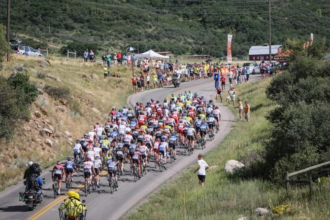 Fans await the peloton on the Snowmass KOM